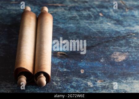 Closed Antique Scroll on a Rustic Blue Wooden Table Stock Photo
