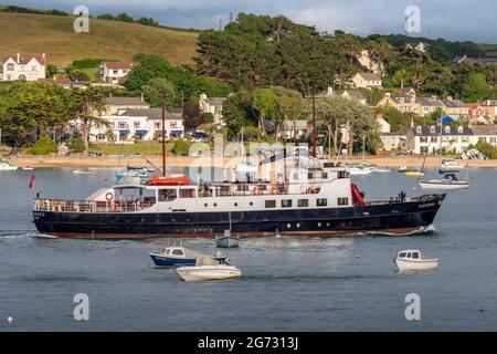 Appledore, North Devon, England. saturday 10th July 2021. Bathed in late afternoon sunshine, the historic vessel MV Oldenburg (launched in 1958) returns to Bideford in North Devon after taking daytrippers and essential supplies to the remote island of Lundy. Credit: Terry Mathews/Alamy Live News Stock Photo