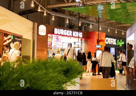 BELARUS, NOVOPOLOTSK - 02 JULE, 2021: Beverage dispensing machine with people Stock Photo