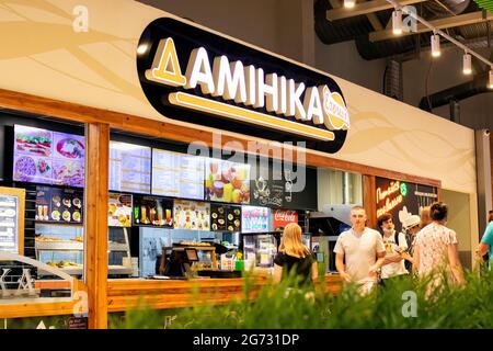 BELARUS, NOVOPOLOTSK - 02 JULE, 2021: Cashier in cafe Dominica close up Stock Photo