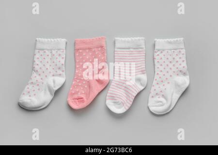 Baby socks on light background Stock Photo