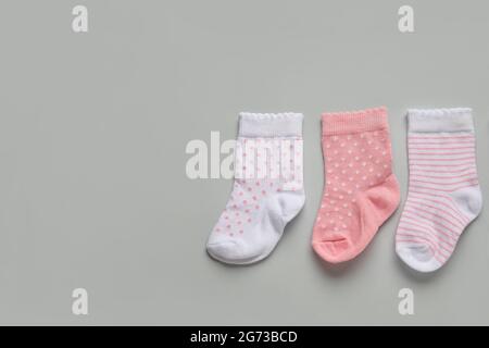 Baby socks on light background Stock Photo