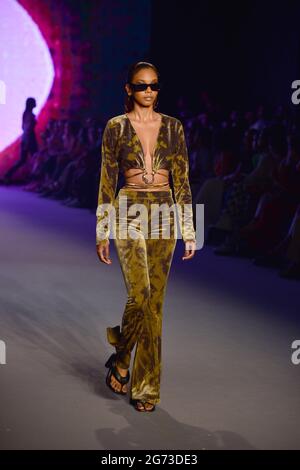 Miami Beach, USA. 09th July, 2021. MIAMI BEACH, FLORIDA - JULY 9: A model walks the runway during The Simonett - Futural Resist FW21 fashion show at PARAISO Tent on July 9, 2021 in Miami Beach, Florida. (Photo by JL/Sipa USA) Credit: Sipa USA/Alamy Live News Stock Photo