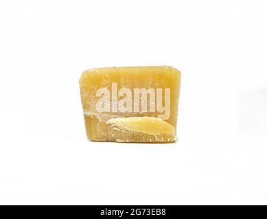 Pure natural Bees Wax (Beeswax) as it Comes Out of the Hive. Melted and  Broken into Pieces. Used in Medicine, Cosmetics and Candle Making Stock  Photo - Alamy