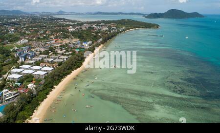 Aerial View of Thai traditional longtail fishing boats in the tropical sea beautiful beach in phuket thailand Stock Photo