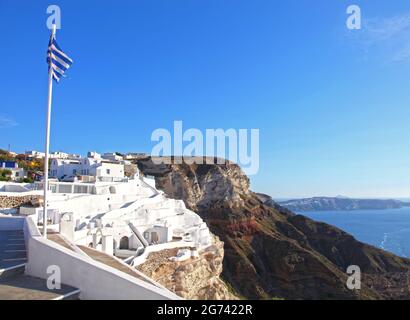 White villas and hotels on clifftops near Fira in Santorini, Greece Stock Photo