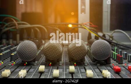 Wireless microphone UHF system in the room controls sound. Stock Photo