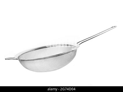 Isolated Stainless colander on white background. Side view of colander. Stock Photo