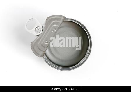 Top view image, Isolated empty canned good on white background. Cover lid is opened. Clipping path create in file. Round shape empty can. Stock Photo