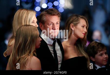 Cannes. 11th July, 2021. U.S. actor and director Sean Penn (C) poses with cast members on the red carpet for the film 'Flag Day' at the 74th edition of the Cannes Film Festival in Cannes, southern France, on July 10, 2021. Credit: Xinhua/Alamy Live News Stock Photo
