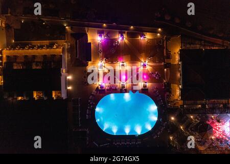 Aerial view of the infinity pool at night. Stock Photo