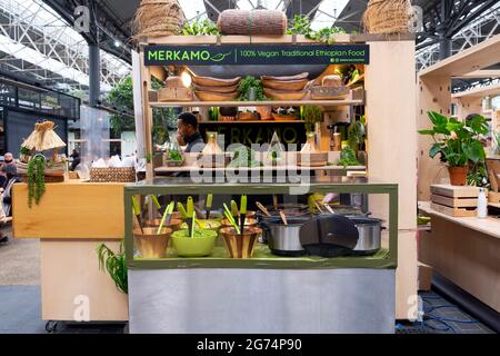 Merkamo Ethiopian East-African food stall open in Old Spitalfields Market interior after lockdown covid restrictions ease East London UK  KATHY DEWITT Stock Photo
