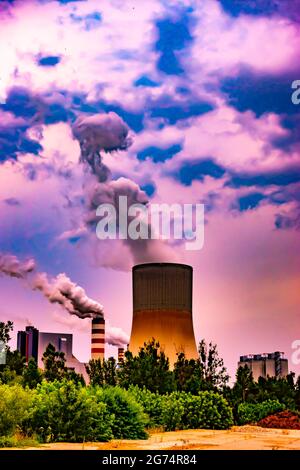 Apocalyptic view for the polluted world with environmentlal damage. Black carbon powered power plant Stock Photo