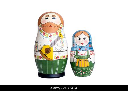 A complete stacking set of Matryoshka doll family with father and mother on a white background. Wooden dolls. Russian Babushka doll set. Stock Photo