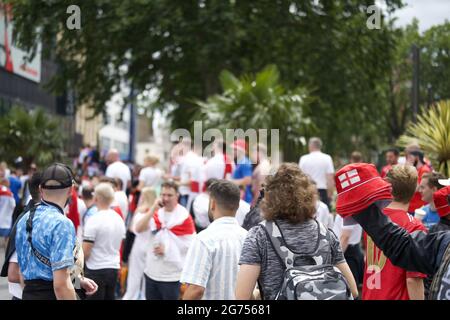 London, UK. 11th July, 2021. Crowds of England fans at Leicester Square ahead of the Euro 2020 Final. Credit: Thomas Eddy/Alamy Live News Stock Photo