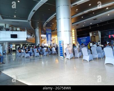 Editorial Photo, Indonesia, South Jakarta, 08 Juli 2021, queueing people at Smesco Building to get vaccine Stock Photo