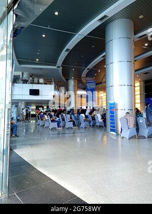 Editorial Photo, Indonesia, South Jakarta, 08 Juli 2021, queueing people at Smesco Building to get vaccine Stock Photo