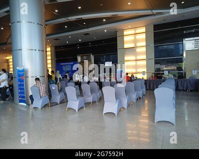 Editorial Photo, Indonesia, South Jakarta, 08 Juli 2021, queueing people at Smesco Building to get vaccine Stock Photo