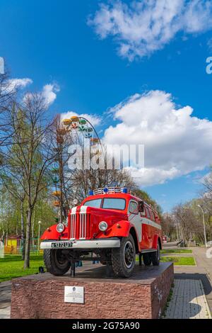 KRASNODAR - MAY 21, 2021: Fire Car Zil from Soviet time, Fire Engine Retro Soviet Car Oldtimer at Krasnodar, background blue cloudy sky, vertical Stock Photo