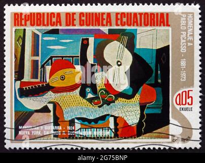 EQUATORIAL GUINEA - CIRCA 1975: a stamp printed in Equatorial Guinea shows Mandolin and Guitar, Painting by Pablo Picasso, circa 1975 Stock Photo