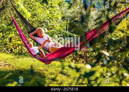 Relaxing placedeck chair in garden. Stock Photo