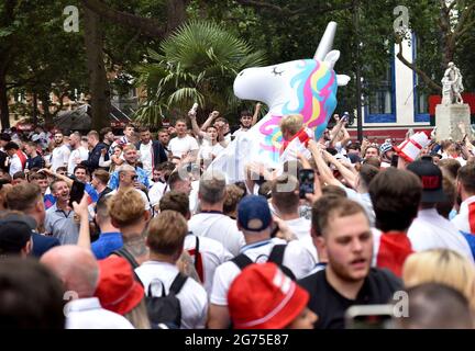 Leicester Square, London, UK. 11th July 2021. England fans fill the West End of London before tonight's UEFA EURO 2020 England v Italy match at Wembley. Credit: Matthew Chattle/Alamy Live News Stock Photo