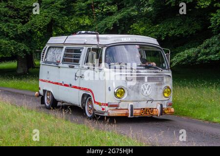 A front view of 1971 70s VW VOLKSWAGEN bay window campervan vintage classic car, retro kombi freedom driver vehicle automobile Stock Photo