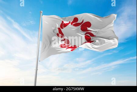 official flag of Saitama prefecture waving in the wind on flagpoles against sky with clouds on sunny day. Japan Patriotic concept. 3d illustration. Stock Photo