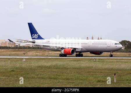 Scandinavian Airlines (SAS) Airbus A330-343 [LN-RKO] departing after being serviced at Lufthansa Technik Malta. Stock Photo