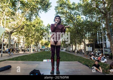 Barcelona, Catalonia, Spain. 9th July, 2021. Protester is seen speaking into microphone.Some 500 people demonstrate in Barcelona against LGTBIphobia and the death of Samuel Luiz, a 24-year-old homosexual young man murdered in a homophobic attack last week in the city of A CoruÃ±a, Spain. Credit: Thiago Prudencio/DAX/ZUMA Wire/Alamy Live News Stock Photo