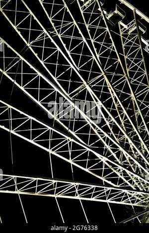 Metal abstract background on black background ferris wheel Stock Photo
