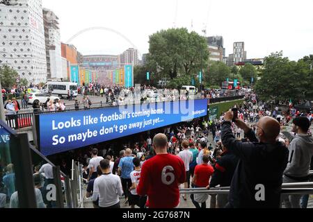 Travelling by tube to Wembley Park for the UEFA Euros 2020 final, between Italy and England, in London, UK Stock Photo