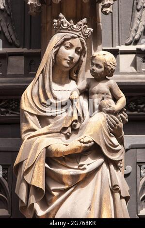 Statue of the Virgin Mary on the gothic façade of St. Martin's Church the biggest church of Colmar. Stock Photo