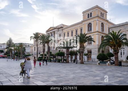 Syros island, Cyclades, Greece. May 26, 2021. Landmark, destination the neoclassical historical town hall at Miaouli square at Hermoupolis capital of Stock Photo