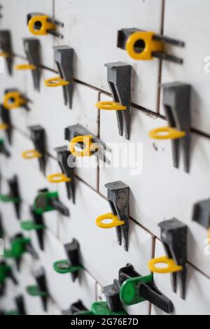View on tile leveling system with plastic clips and wedges Stock Photo