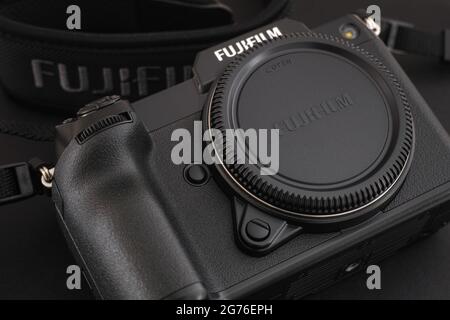 Tambov, Russian Federation - June 29, 2021 Fujifilm GFX 100S medium format camera on a black background. Low key. Close up. Stock Photo