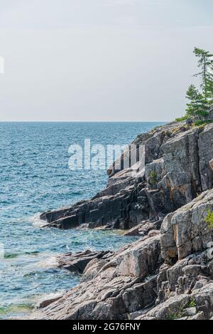 Rocky promontory in Superior Lake Park. Canada Stock Photo