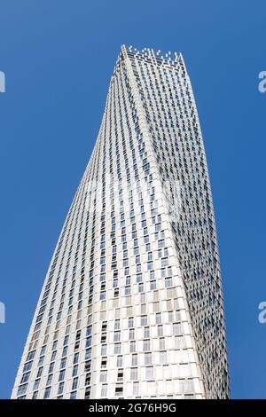 Cayan Tower, a skyscraper built in Dubai Marina, UAE. Building also know as Infinity Tower. Twisting architectural style. Stock Photo