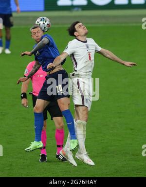 London, England, 11th July 2021. Federico Bernardeshi of Italy challenges Harry Maguire of England  during the UEFA Euro 2020 final at Wembley Stadium, London. Picture credit should read: David Klein / Sportimage Credit: Sportimage/Alamy Live News Stock Photo