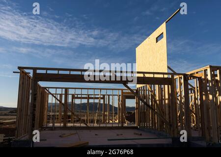 Two story house in progress in a development Stock Photo