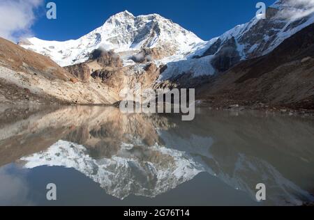 Mount Makalu mirroring in lake, Makalu Barun national park, Nepal Himalayas mountains Stock Photo
