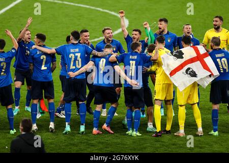 London, UK. 12th July, 2021. Football: European Championship, Italy - England, final round, final at Wembley Stadium. Italy's players celebrate their victory. Credit: Christian Charisius/dpa/Alamy Live News Stock Photo