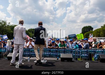 Washington, DC, USA, 11 July, 2021.  Pictured: Former Senator Norm Coleman (R-MN) and former Representative Ron Klein (D-FL) speak at the 'No Fear Rally in Solidarity with the Jewish People' event at the US Capitol in Washington, DC.   The rally was sponsored by Alliance for Israel, Jewish National Fund, the Anti-Defamation League, and roughly 25 other organizations.  Some speakers promoted Zionism, while others spoke about the threat posed by antisemitism.  Credit: Allison Bailey / Alamy Live News Stock Photo