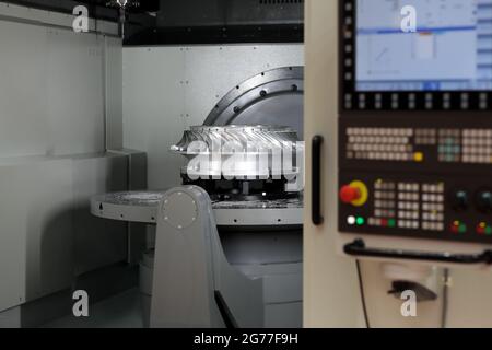 Large CNC milling machine with rotary table. Selective focus. Stock Photo