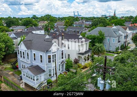 NEW ORLEANS, LA, USA - JUNE 30, 2021: Rooftop view of historic Uptown houses on Prytania Street Stock Photo