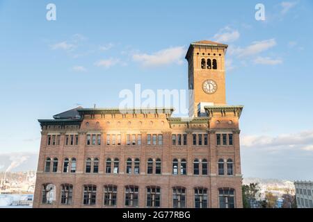 Industrial building with clock tower exterior at Tacoma, Washington Stock Photo