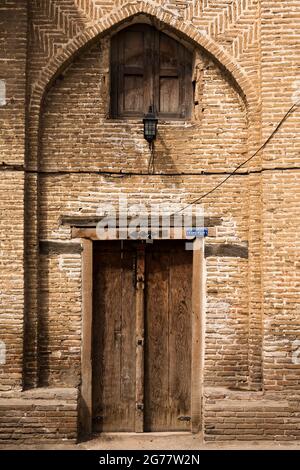 Old doorway of brick tomb tower, Noor Imam Zade Holy Place(Imamzadeh ye Nur)Gorgan, Golestan Province, Iran, Persia, Western Asia, Asia Stock Photo