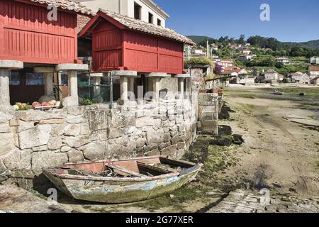 Old abandoned rowing boat in the town of Combarro, Galicia, Spain. Stock Photo