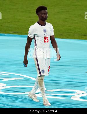 File photo dated 11-07-2021 of England's Bukayo Saka stands dejected following the UEFA Euro 2020 Final at Wembley Stadium, London. Issue date: Monday July 12, 2021. Stock Photo