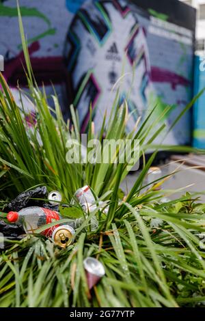 Wembley Park, UK. 12th July 2021.  Thousands of England fans left Wembley Park covered in litter and smelling like a brewery following yesterday’s raucous behaviour, before, during and after the Euro 2020 Final between Italy and England at Wembley Stadium.   Amanda Rose/Alamy Live News Stock Photo